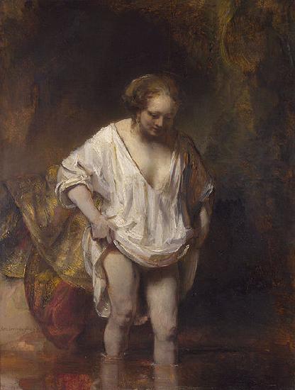 REMBRANDT Harmenszoon van Rijn A woman bathing. oil painting image